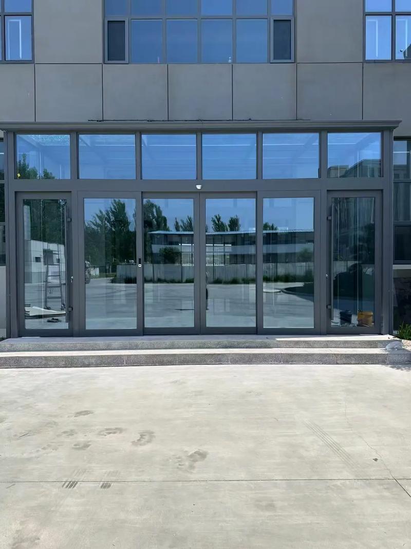 玻璃感应门 现代建筑的智能屏障与美学融合